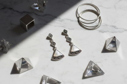 Art Deco marcasite pearl earrings flat - geometric: marble, silver accessories, dramatic light