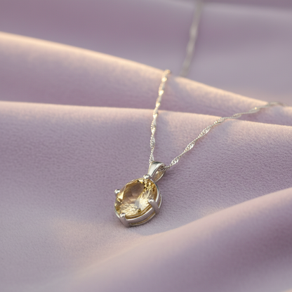 Citrine pendant on lavender background