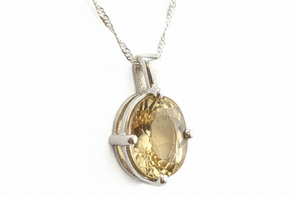 Citrine pendant with exact stone on white background