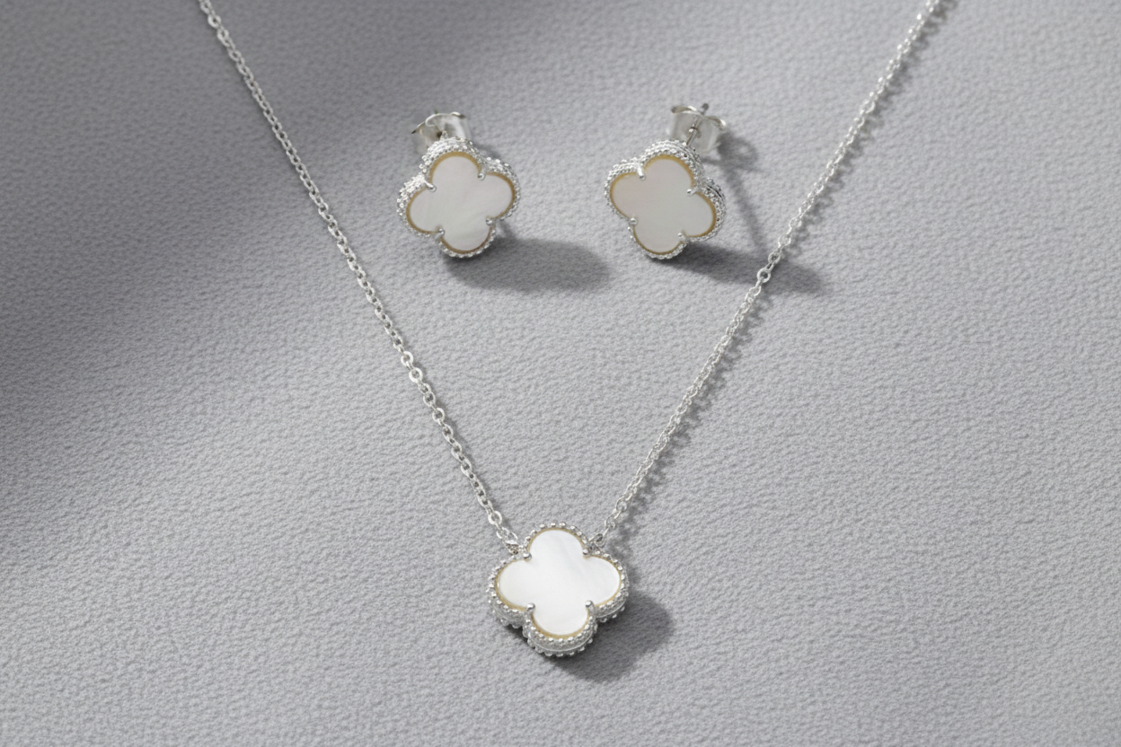 Jewelry set on grey textured background