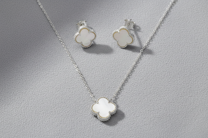 Jewelry set on grey textured background