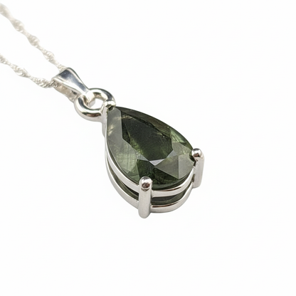 Moldavite pendant detail with white background