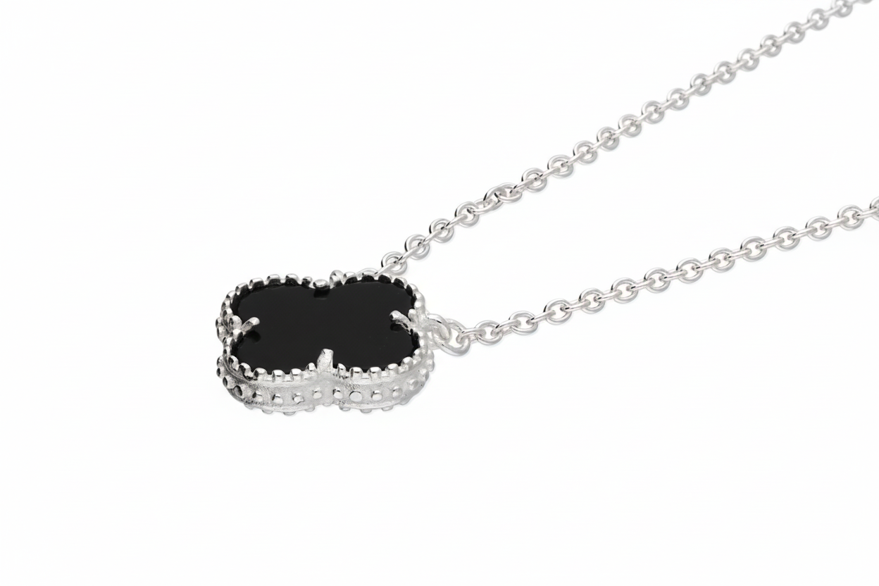 Silver clover pendant with black onyx - side angle, zoomed out 30%, 3:2