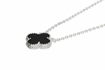 Silver clover pendant with black onyx - side angle, zoomed out 30%, 3:2